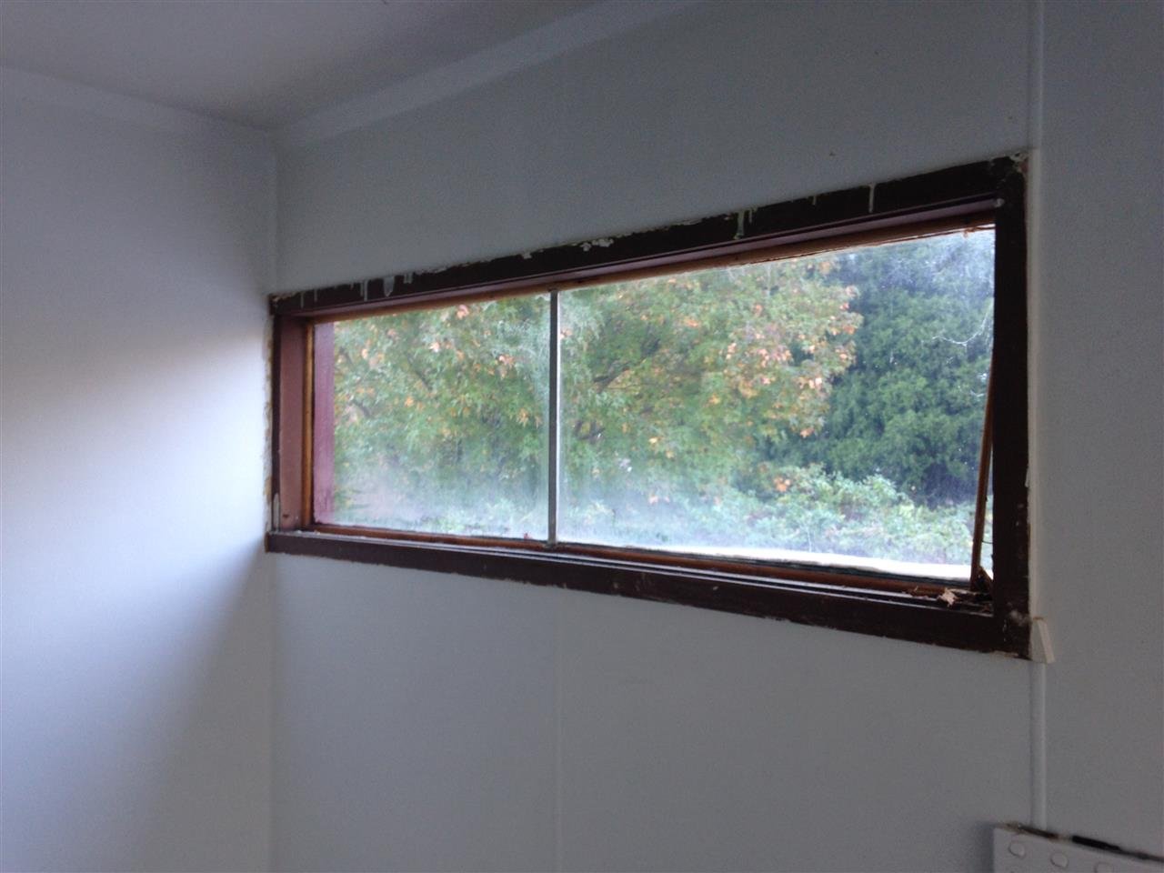 Original timber window before repair and replacement glazing
